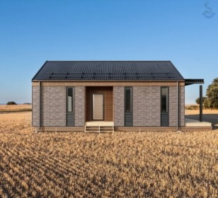 КД-670: одноэтажный барнхаус с террасой и высокими потолками