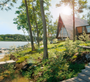 КД-630: двухэтажный каркасный дом с панорамными окнами и двумя террасами